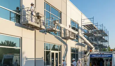 Commercial building painting by professional painters in Allen, TX with durable exterior coatings