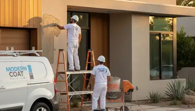 Professional stucco repair and painting on residential home exterior in Allen, TX
